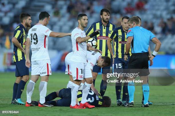 Wout Brama of the Mariners lays on the ground injured during the round 11 A-League match between the Central Coast and the Western Sydney Wanderers...