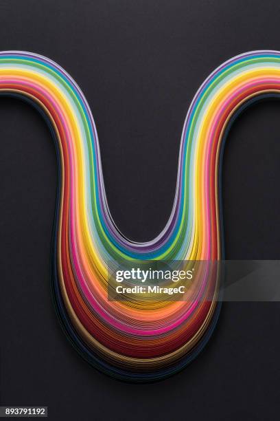 abstract rainbow paper pile - letter u stock pictures, royalty-free photos & images