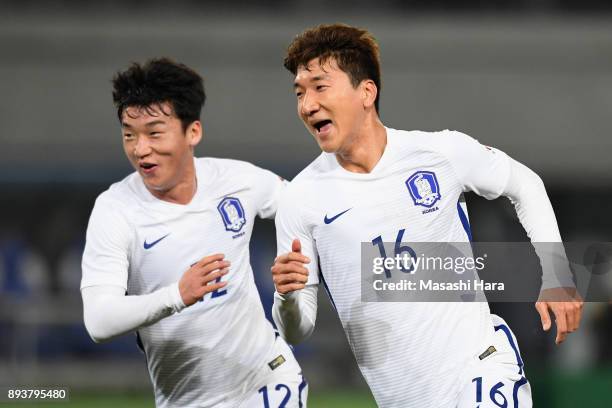 Jung Wooyoung of South Korea celebrates scoring his side's sescond goal to make it 2-1 with his team mate Lee Changmin during the EAFF E-1 Men's...