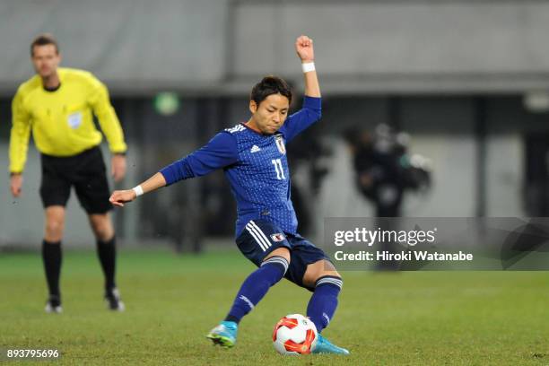 Yu Kobayashi of Japan converts the penalty to score the opening goal during the EAFF E-1 Men's Football Championship between Japan and South Korea at...