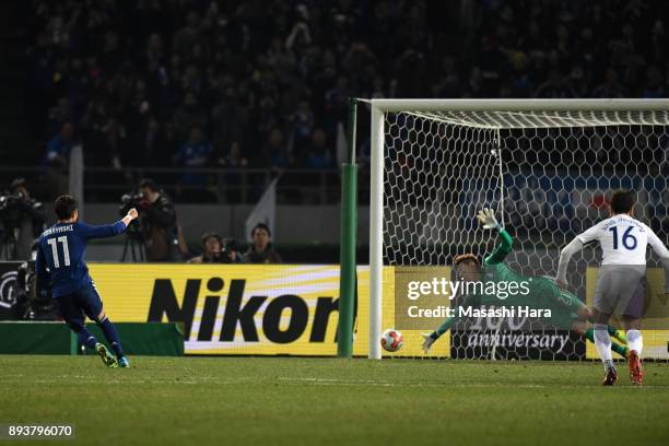 Yu Kobayashi of Japan converts the penalty to score the opening goal during the EAFF E-1 Men's Football Championship between Japan and South Korea at...