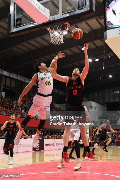 Alex Kirk of the Alvark Tokyo contests a rebound with Shusuke Ikuhara of the Tochigi Brex during the B.League B1 game between Alvark Tokyo and...