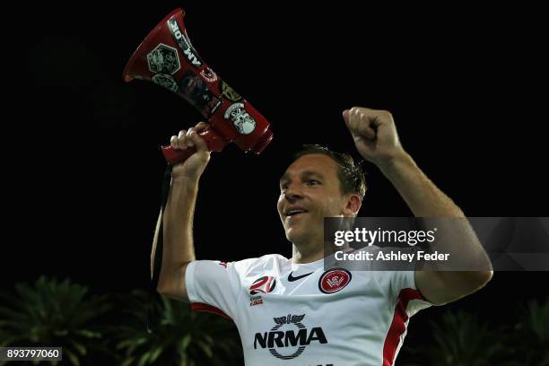 Brendon Santalab of the Wanderers celebrates the win with the fan club megaphone during the round 11 A-League match between the Central Coast and the...