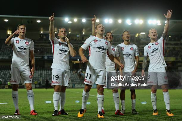 Wanderers team mates celebrate the win during the round 11 A-League match between the Central Coast and the Western Sydney Wanderers at Central Coast...