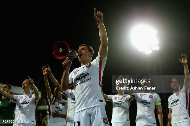 Brendon Santalab of the Wanderers celebrates the win with his team and fans during the round 11 A-League match between the Central Coast and the...