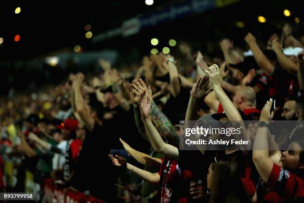 Western Sydney fans celebrate the win during the round 11 A-League match between the Central Coast and the Western Sydney Wanderers at Central Coast...