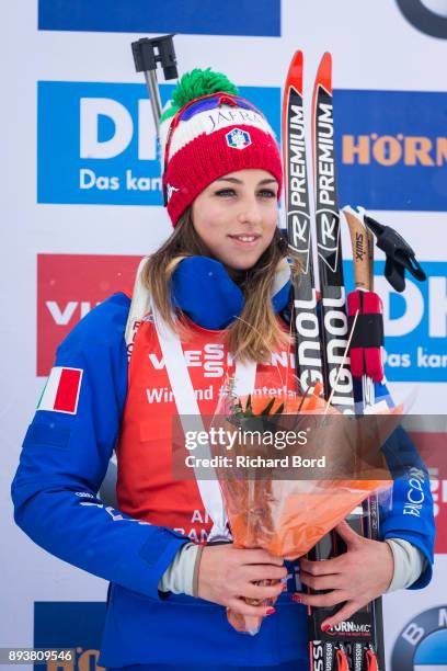 3rd place Lisa Vittozzi of Italy poses on the podium after the IBU Biathlon World Cup Women's Pursuit on December 16, 2017 in Le Grand Bornand,...