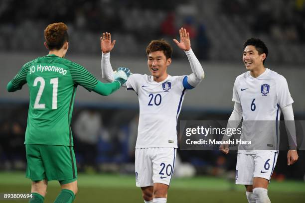 Jo Hyeonwoo, Jang Hyunsoo and Yun Youngsun of South Korea celebrate the East Asian Champions following their 4-1 victory in the EAFF E-1 Men's...