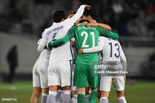 South Korean players celebrate the East Asian Champions following their 4-1 victory in the EAFF E-1 Men's Football Championship between Japan and...