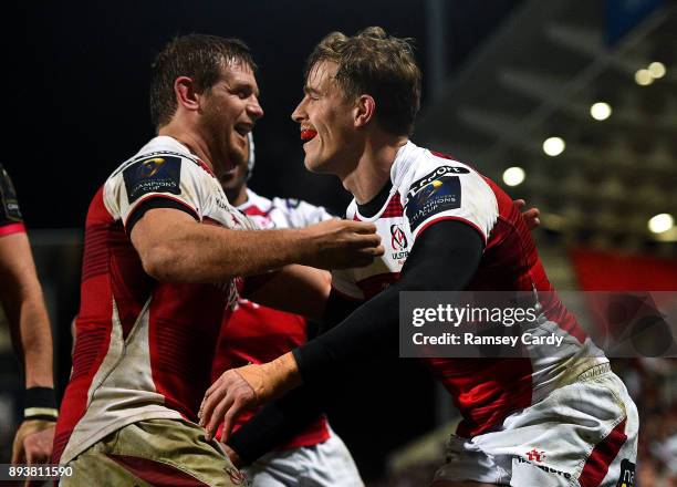 Belfast , United Kingdom - 15 December 2017; Andrew Trimble, right, is congratulated by his Ulster team-mate Chris Henry after scoring their sixth...