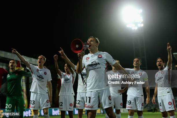 Brendon Santalab of the Wanderers celebrates the win with his team and fans during the round 11 A-League match between the Central Coast and the...