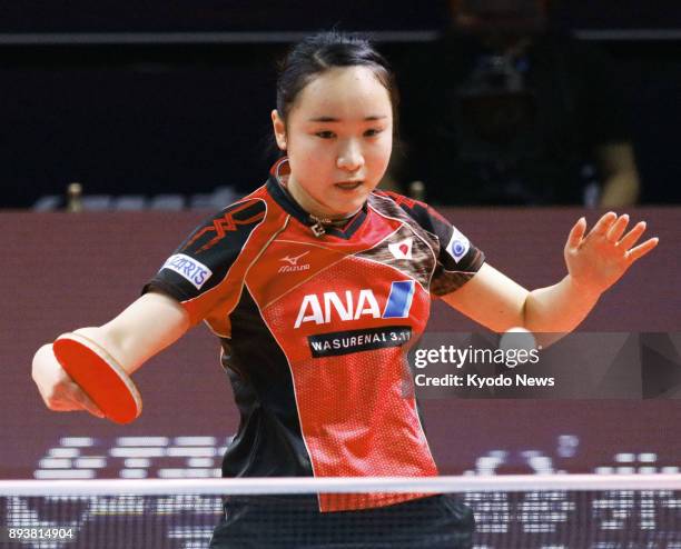 Mima Ito of Japan plays a shot during her quarterfinal match against China's Chen Xingtong at the season-ending ITTF World Tour Grand Finals in...