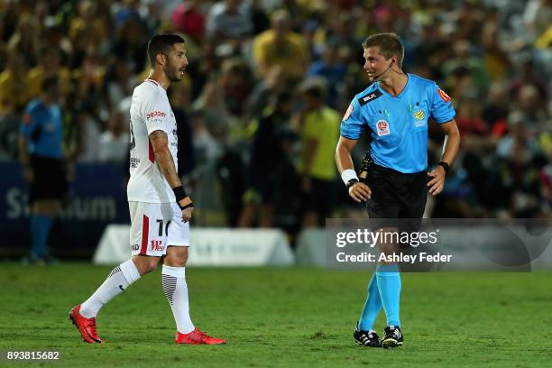 Alvaro Cejudo of the Wanderers speaks with Referee Alex King about a decision during the round 11 A-League match between the Central Coast and the...