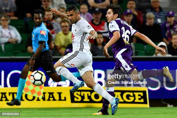 Ali Abbas of the Phoenix contests the ball against Jacob Italiano of the Glory during the round 11 A-League match between the Perth Glory and the...