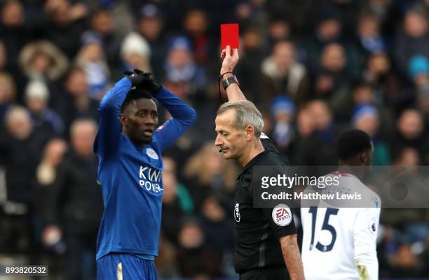 Wilfred Ndidi of Leicester City is shown a red card by referee Martin Atkinson during the Premier League match between Leicester City and Crystal...