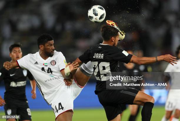 Fares Juma of Al Jazira competes with Franco Jara of CF Pachuca during the FIFA Club World Cup UAE 2017 third place play off match between Al Jazira...