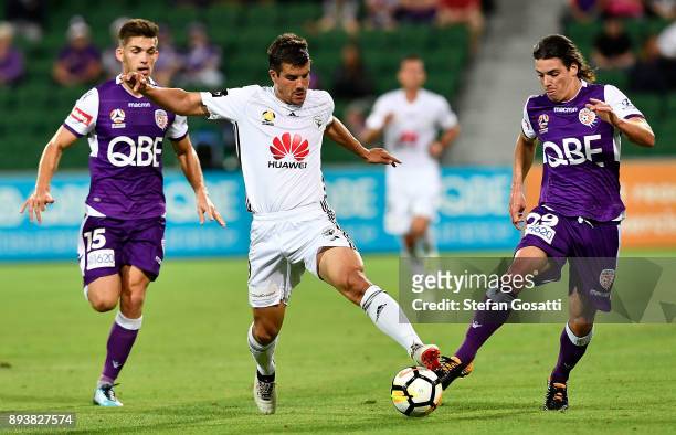 Andrija Kaludjerovic of the Phoenix contests the ball against Jeremy Walker of the Glory during the round 11 A-League match between the Perth Glory...