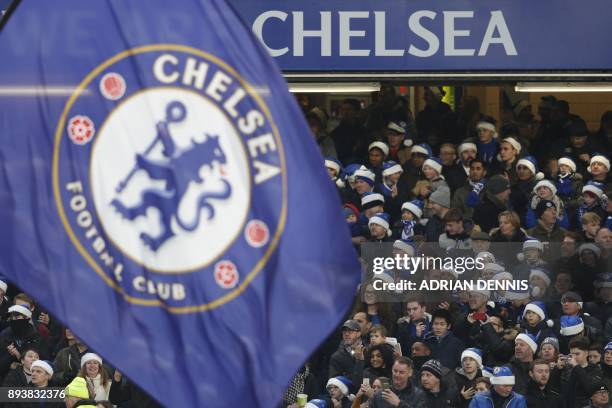 Chelsea fans wear blue santa hats during the English Premier League football match between Chelsea and Southampton at Stamford Bridge in London on...