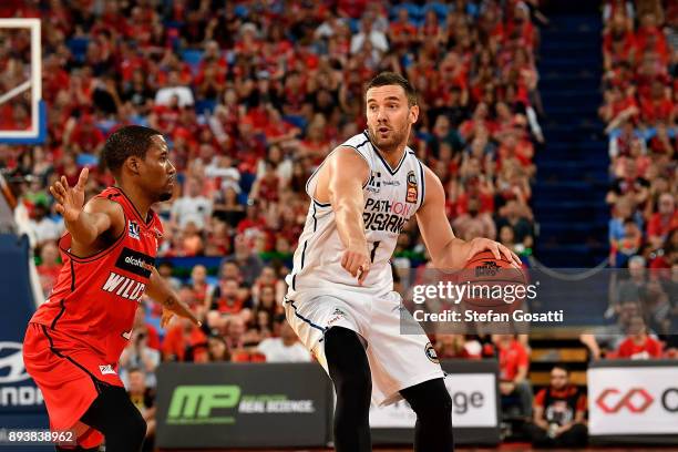 Adam Gibson of the Bullets looks to pass the ball during the round 10 NBL match between the Perth Wildcats and the Brisbane Bullets at Perth Arena on...