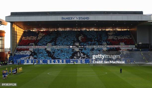 Rangers fans participate in a display during the Ladbrokes Scottish Premiership match between Rangers and St Johnstone at Ibrox Stadium on December...