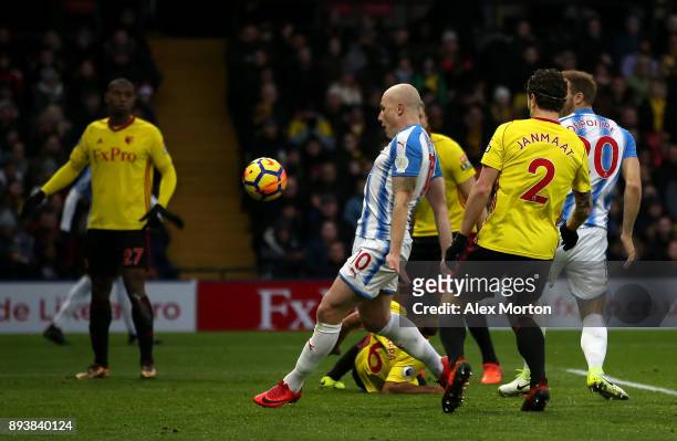 Aaron Mooy of Huddersfield Town scores his sides second goal during the Premier League match between Watford and Huddersfield Town at Vicarage Road...
