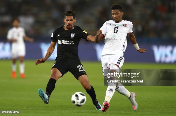 Saif Khalfan of Al Jazira is challenged by Franco Jara of CF Pachuca during the FIFA Club World Cup UAE 2017 third place play off match between Al...