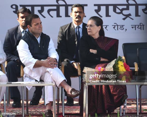 Newly elect Congress President Rahul Gandhi with his mother and predecessor Sonia Gandhi during an elevation event held at the lawns of the All India...