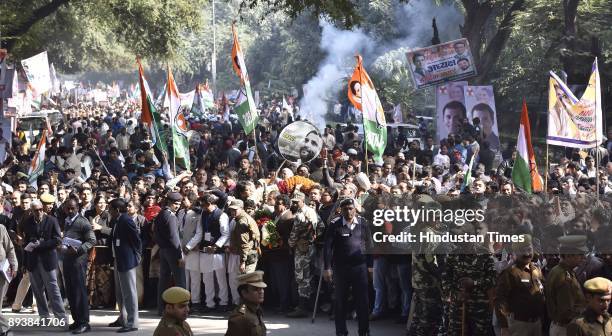 Congress supporters and workers celebrating during newly elected Congress president Rahul Gandhi's elevation to the top post in a grand elevation...