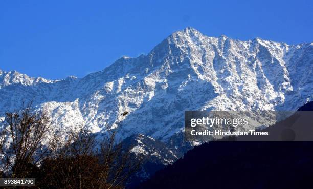 View of snow covered Dhauladhar Mountain, on December 16, 2017 in Dharamsala, India. Northern India has turned into winter wonderland. Snowfall has...