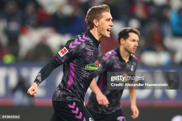 Nils Petersen of Freiburg celebrates scoring the 2nd team goal during the Bundesliga match between FC Augsburg and Sport-Club Freiburg at WWK-Arena...