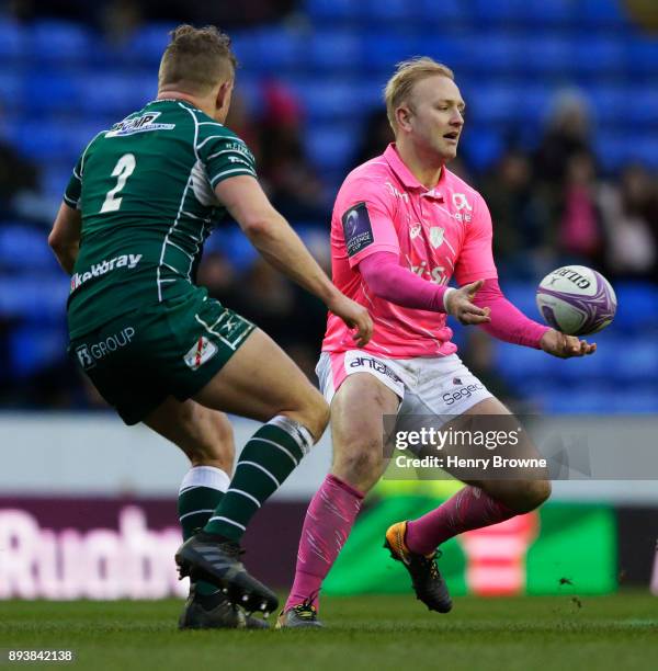 Shane Geraghty of Stade Francais passes the ball during the European Rugby Challenge Cup match between London Irish and Stade Francais on December...