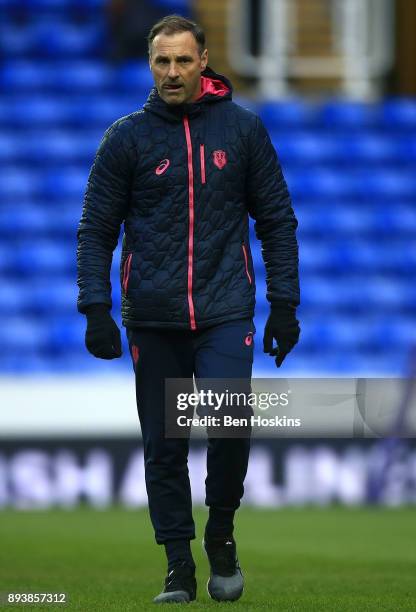 Greg Cooper, Stade Francais head coach looks on ahead of the European Rugby Challenge Cup match between London Irish and Stade Francais on December...