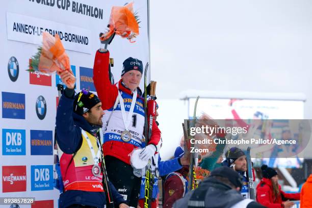 Johannes Thingnes Boe of Norway takes 1st place, Martin Fourcade of France takes 2nd place, Anton Shipulin of Russia takes 3rd place during the IBU...