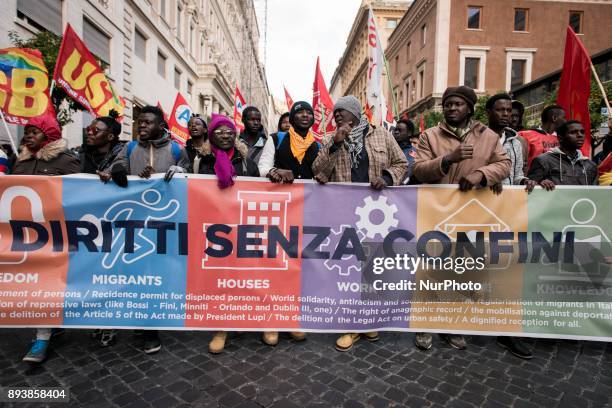 People take part at 'Fight for Right 'demonstration in Rome, Italy, on 16th of december 2017, in support of right of migrants and refugees.