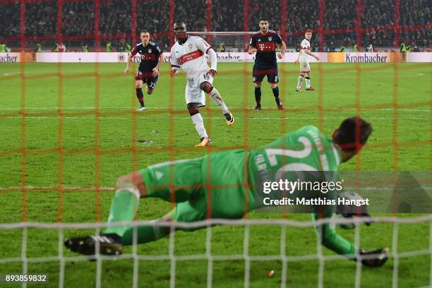 Sven Ulreich of Bayern Muenchen saves a penalty against Chadrac Akolo of Stuttgart during the Bundesliga match between VfB Stuttgart and FC Bayern...