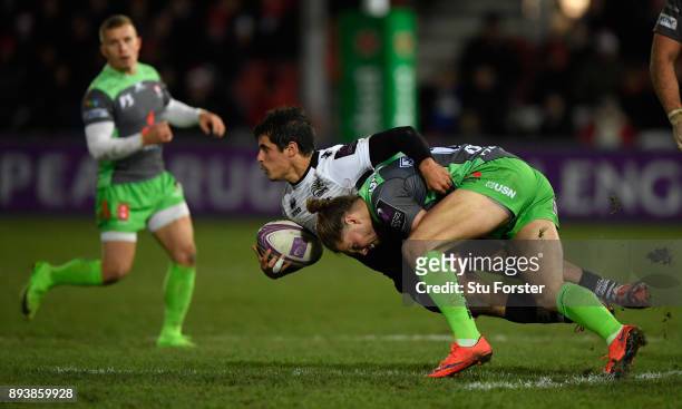 Gloucester player Henry Purdy tackles Serafin Bordoli of Zebre during the European Rugby Challenge Cup match between Gloucester Rugby and Zebre at...