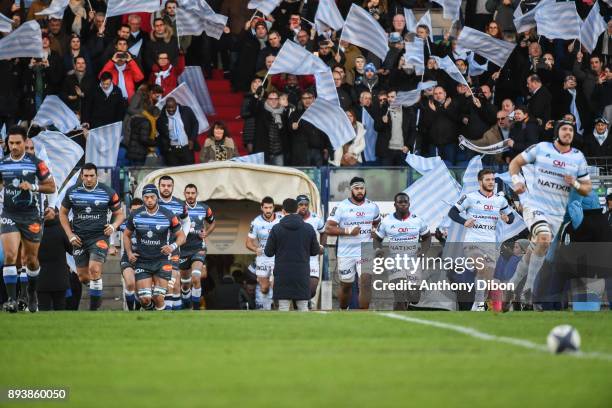 Team of Castres and team of Racing enters on the pitch during the European Champions Cup match between Racing 92 and Castres at Stade Yves Du Manoir...