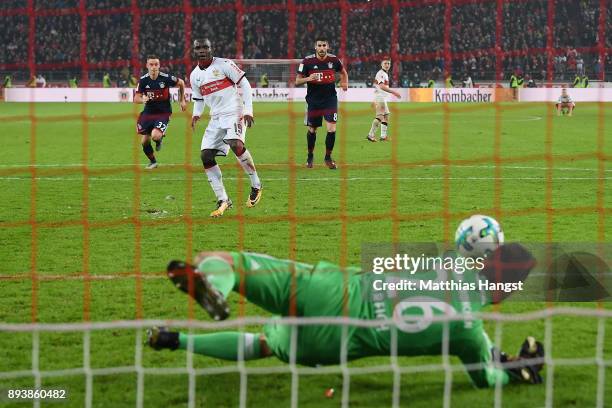 Sven Ulreich of Bayern Muenchen saves a penalty against Chadrac Akolo of Stuttgart during the Bundesliga match between VfB Stuttgart and FC Bayern...