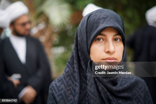 muslim woman portrait on street - iraqi woman stock pictures, royalty-free photos & images
