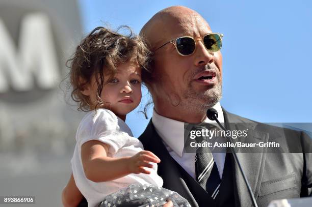 Actor Dwayne Johnson and daughter Jasmine Johnson attend the ceremony honoring Dwayne Johnson with star on the Hollywood Walk of Fame on December 13,...