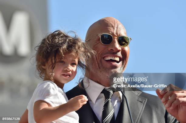 Actor Dwayne Johnson and daughter Jasmine Johnson attend the ceremony honoring Dwayne Johnson with star on the Hollywood Walk of Fame on December 13,...