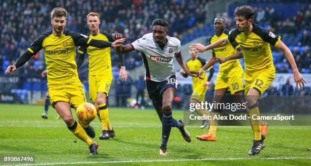 Bolton Wanderers' Sammy Ameobi battles with Burton Albion's Luke Murphy and Tom Flanagan during the Sky Bet Championship match between Bolton...