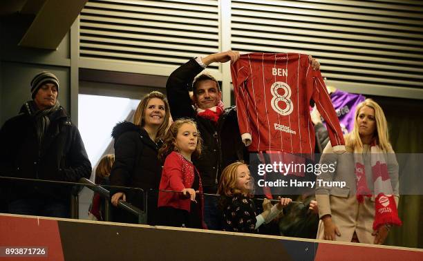 The family of Young Bristol City fan Benjamin Pritchard who sadly passed away aged 8 hold up a shirt dedicated to him at the final whistle during the...