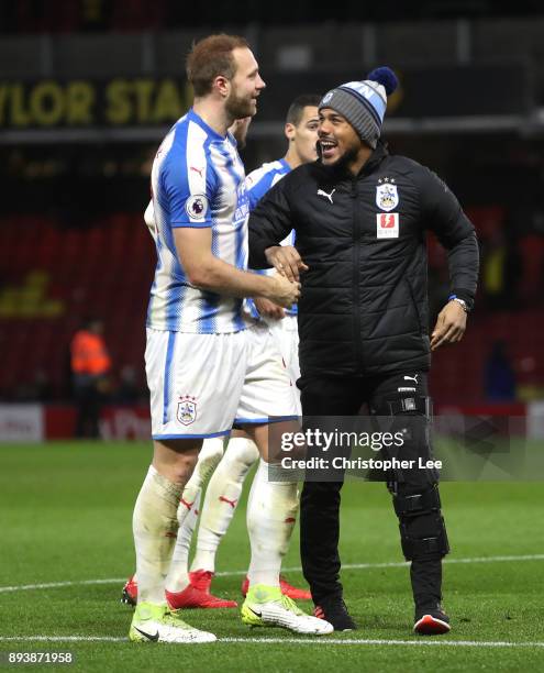 Elias Kachunga of Huddersfield Town and Laurent Depoitre of Huddersfield Town celebrate victory after the Premier League match between Watford and...