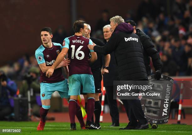 Declan Rice of West Ham United comes on for Mark Noble of West Ham United during the Premier League match between Stoke City and West Ham United at...
