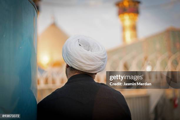 muslim religious man in karbala - shi'ite islam stock pictures, royalty-free photos & images