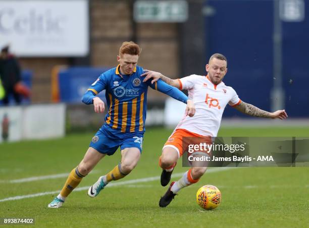 Jon Nolan of Shrewsbury Town and Jay Spearing of Blackpool during the Sky Bet League One match between Shrewsbury Town and Blackpool at New Meadow on...