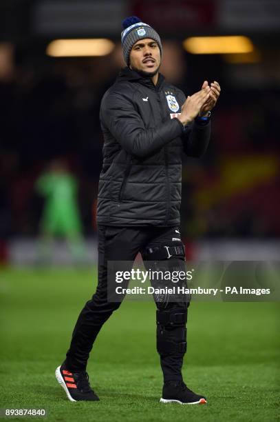 Huddersfield Town's Elias Kachunga celebrates victory after the Premier League match at Vicarage Road, Watford.