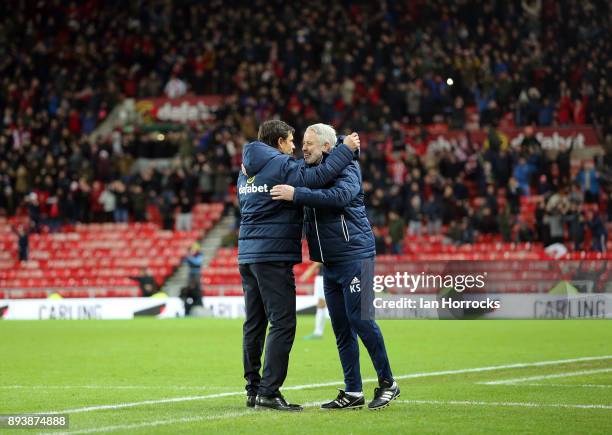 Sunderland manager Chris Coleman and assistant Kit Symons celebrate the home win on the final whistle during the Sky Bet Championship match between...