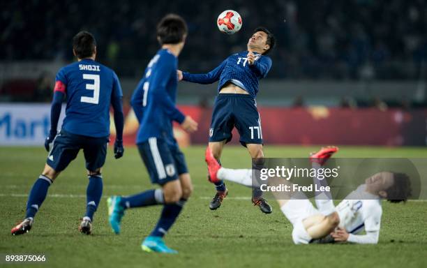 Yasuyuki of Japan in action during the EAFF E-1 Men's Football Championship between Japan and South Korea at Ajinomoto Stadium on December 16, 2017...